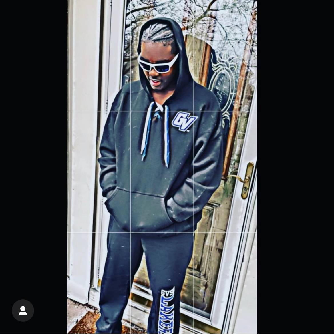 young man wearing GVSU hoody and sweatpants